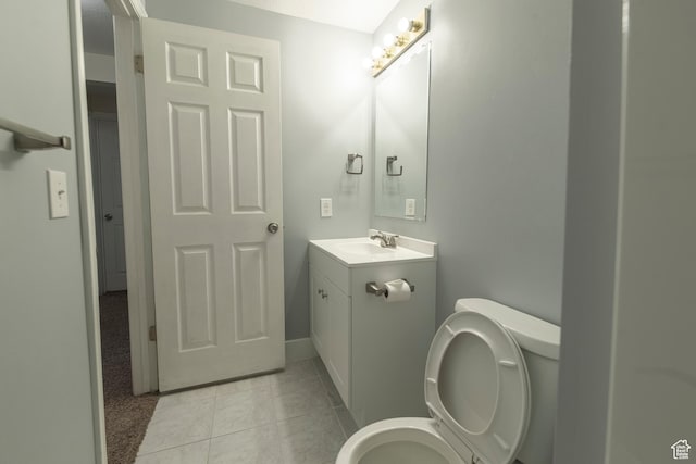 2979 W 4275 S, Roy, UT 84067 - bathroom with vanity, toilet, tile patterned flooring, and baseboards
