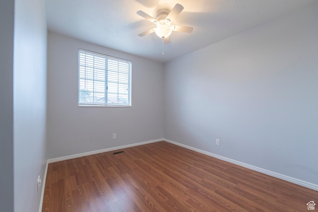 2979 W 4275 S, Roy, UT 84067 - empty room with wood finished floors, ceiling fan, and baseboards