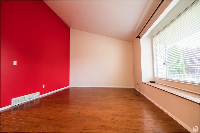 2979 W 4275 S, Roy, UT 84067 - empty room featuring lofted ceiling, wood finished floors, and baseboards