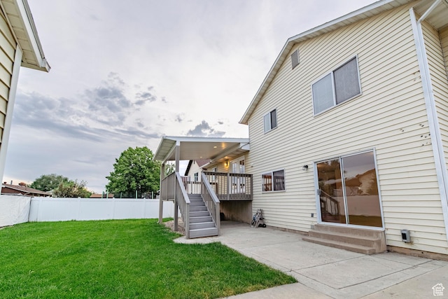 2979 W 4275 S, Roy, UT 84067 - rear view of house with entry steps, a patio, stairs, and a deck
