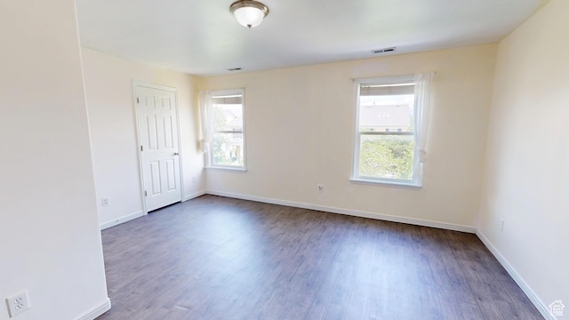 4937 W Calton Ln S, South Jordan, UT 84009 - spare room with plenty of natural light, wood finished floors, and baseboards