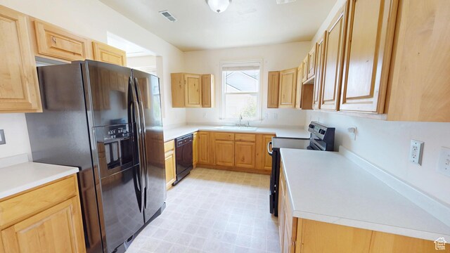 4937 W Calton Ln S, South Jordan, UT 84009 - kitchen featuring black appliances, light brown cabinetry, light countertops, and a sink