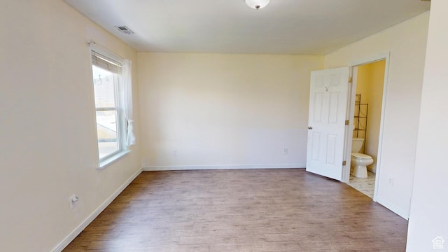 4937 W Calton Ln S, South Jordan, UT 84009 - spare room featuring wood finished floors and baseboards