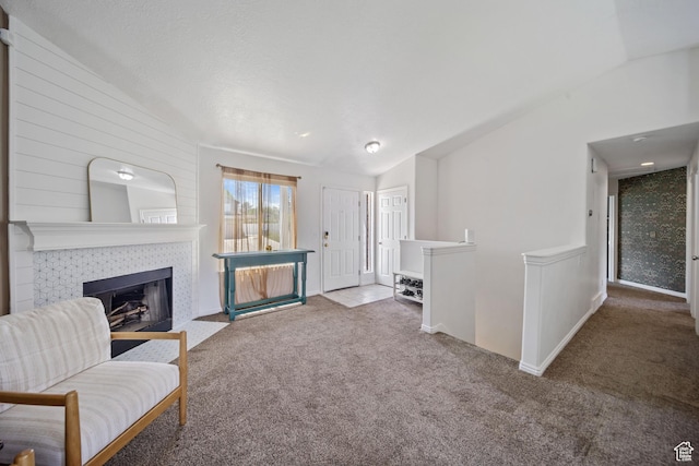 6262 W Contadora Dr S, West Valley City, UT 84128 - living room with vaulted ceiling, carpet floors, and a tile fireplace