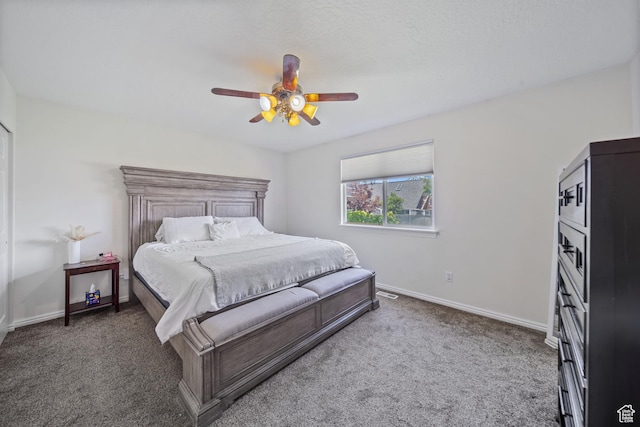 6262 W Contadora Dr S, West Valley City, UT 84128 - carpeted bedroom with baseboards and a ceiling fan