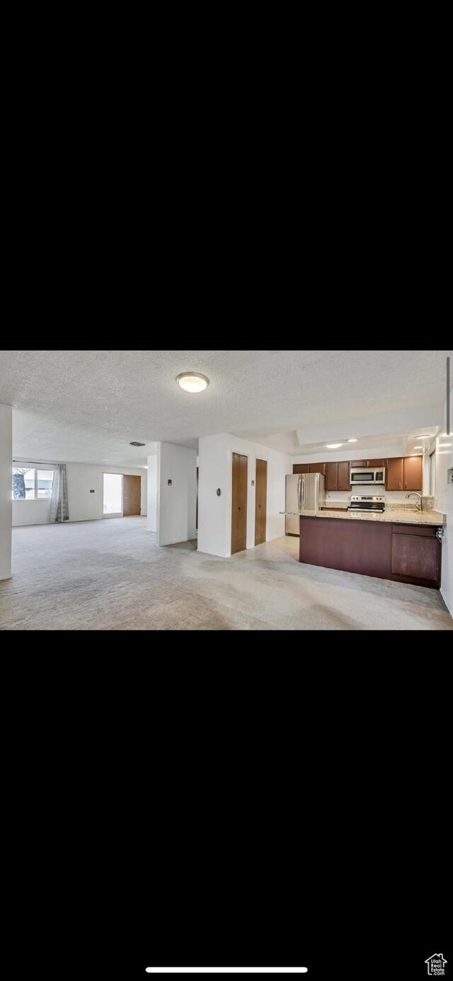 5540 S 850 E Unit 38, South Ogden, UT 84405 - view of front of property featuring a patio
