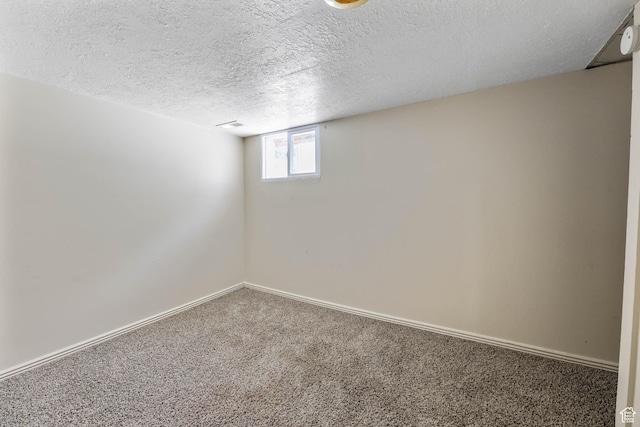 806 E Canyon Rd, Ogden, UT 84404 - below grade area with carpet, baseboards, and a textured ceiling