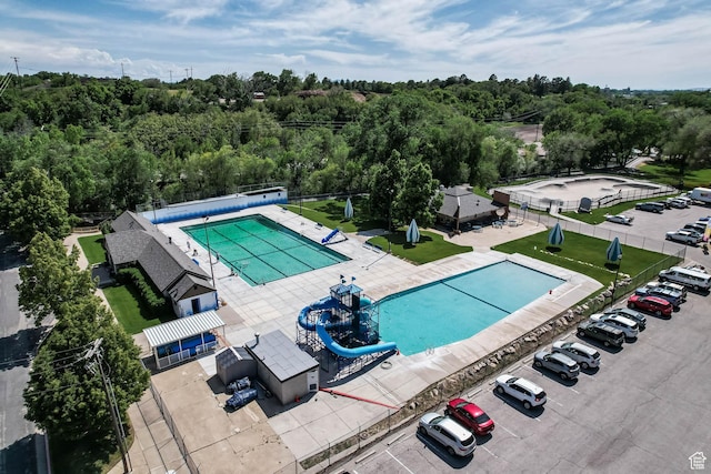 806 E Canyon Rd, Ogden, UT 84404 - drone / aerial view of a pool and a heavily wooded area