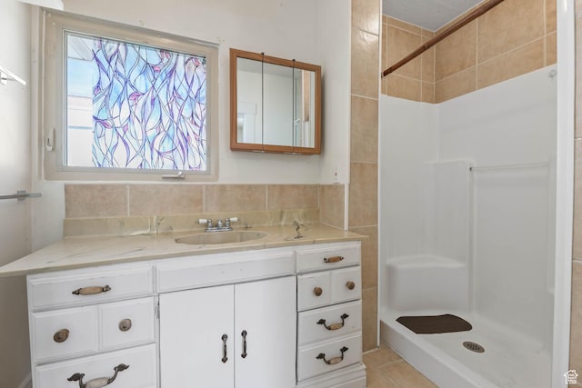 806 E Canyon Rd, Ogden, UT 84404 - bathroom featuring vanity, a shower, and healthy amount of natural light