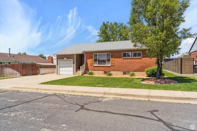 320 E 4600 S, Washington Terrace, UT 84405 - ranch-style home featuring an attached garage, driveway, and brick siding