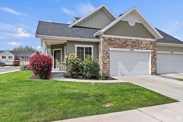 1918 W City Village Way Unit 140, Riverton, UT 84065 - craftsman inspired home featuring board and batten siding, a front yard, driveway, and a garage