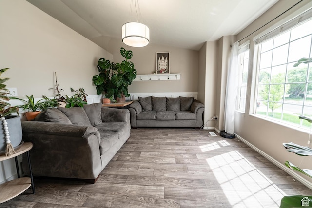 1542 N 2530 W, Clinton, UT 84015 - living room with vaulted ceiling and wood finished floors