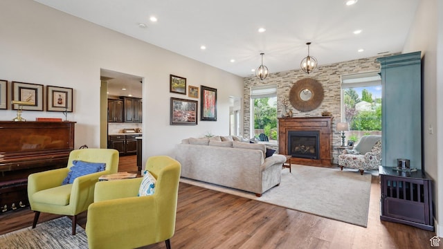 372 N Waterside Rd W, Heber City, UT 84032 - living area with recessed lighting, wood finished floors, and a glass covered fireplace