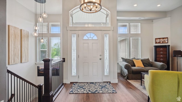 372 N Waterside Rd W, Heber City, UT 84032 - foyer entrance featuring wood finished floors, a high ceiling, baseboards, and recessed lighting