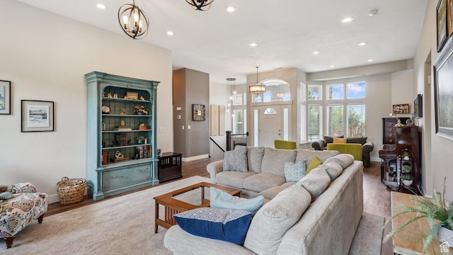 372 N Waterside Rd W, Heber City, UT 84032 - living room featuring a chandelier, recessed lighting, baseboards, and wood finished floors