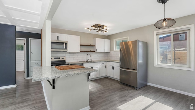1276 W 1100 N, Salt Lake City, UT 84116 - kitchen featuring stainless steel appliances, open shelves, white cabinets, decorative backsplash, and light stone countertops