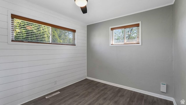 1276 W 1100 N, Salt Lake City, UT 84116 - unfurnished room featuring ceiling fan, crown molding, dark wood-style flooring, and baseboards