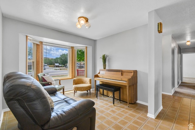 155 S 200 W, Gunnison, UT 84634 - living area featuring baseboards and light tile patterned floors