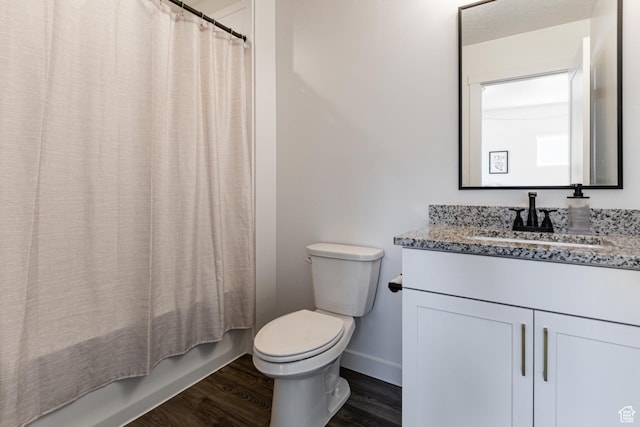 849 N Evelyn St W, Farmington, UT 84025 - bathroom featuring baseboards, vanity, toilet, wood finished floors, and shower / tub combo with curtain
