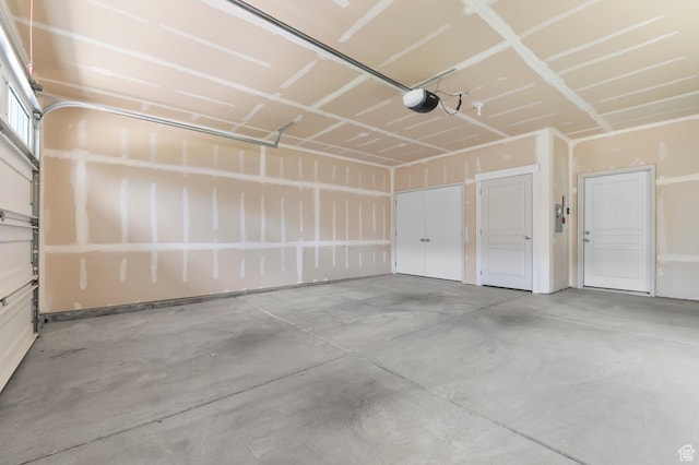 4908 W Duckhorn Dr, South Jordan, UT 84009 - garage featuring a garage door opener