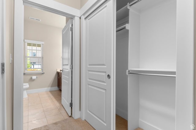 4908 W Duckhorn Dr, South Jordan, UT 84009 - bathroom with toilet, vanity, tile patterned floors, and baseboards