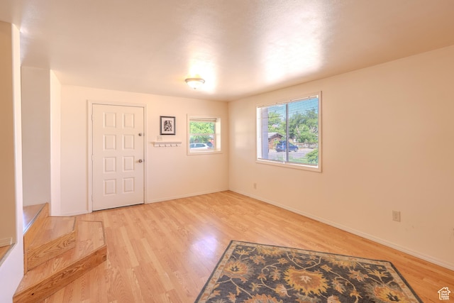 476 Cliffview Dr, Moab, UT 84532 - foyer entrance with light wood finished floors and baseboards