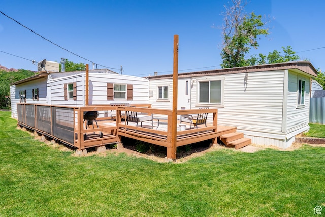 476 Cliffview Dr, Moab, UT 84532 - back of property with a yard and a wooden deck
