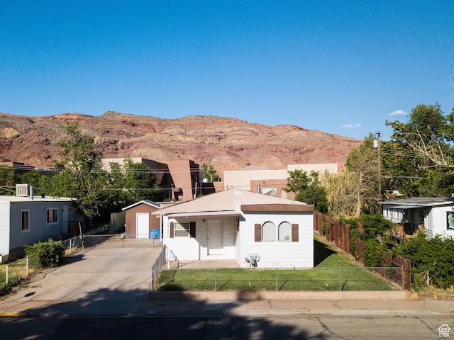 476 Cliffview Dr, Moab, UT 84532 - view of front facade featuring a mountain view
