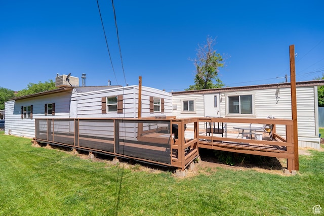 476 Cliffview Dr, Moab, UT 84532 - rear view of property with a lawn and a wooden deck