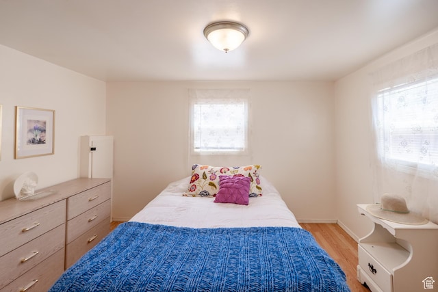 476 Cliffview Dr, Moab, UT 84532 - bedroom featuring light wood-style flooring and baseboards