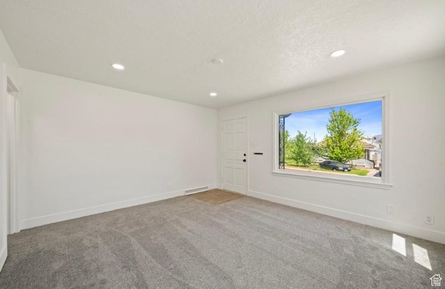 133 Country Club Dr, South Ogden, UT 84405 - carpeted spare room with recessed lighting, baseboards, and a textured ceiling