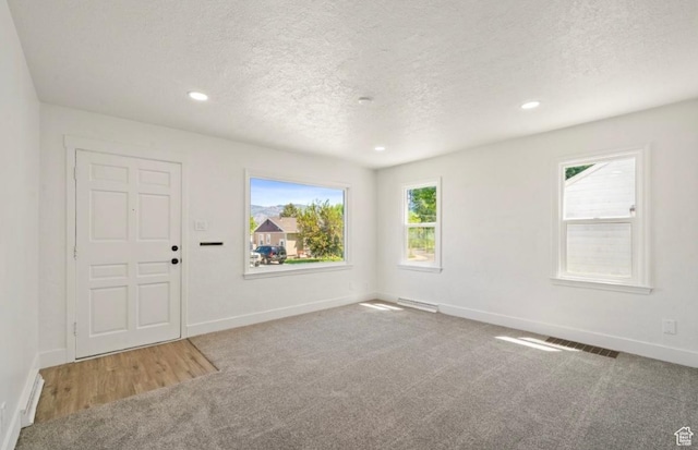 133 Country Club Dr, South Ogden, UT 84405 - carpeted empty room with baseboards, a textured ceiling, and recessed lighting