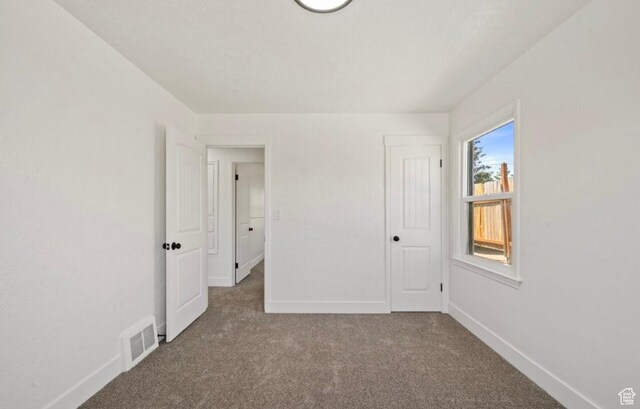133 Country Club Dr, South Ogden, UT 84405 - unfurnished bedroom with carpet floors and baseboards
