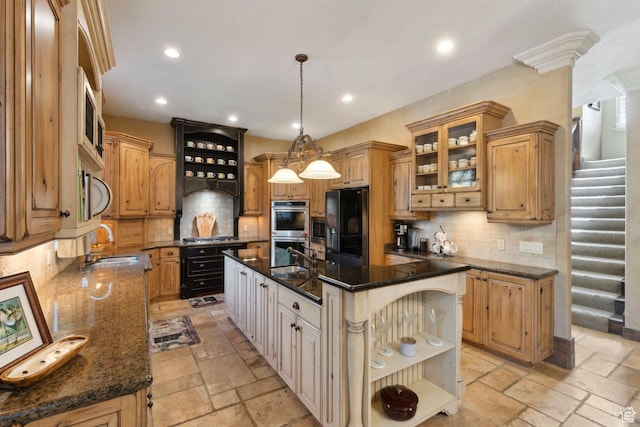 13302 S Corner Wood Dr E, Draper, UT 84020 - kitchen with a sink, appliances with stainless steel finishes, open shelves, a kitchen island with sink, and decorative backsplash