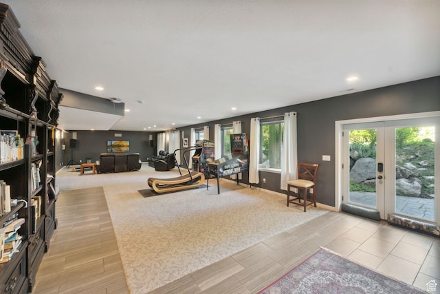 13302 S Corner Wood Dr E, Draper, UT 84020 - living room featuring french doors, wood finish floors, baseboards, and recessed lighting