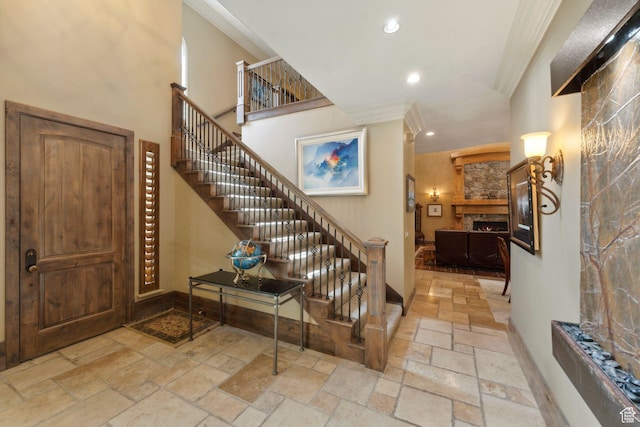13302 S Corner Wood Dr E, Draper, UT 84020 - stairs with stone tile floors, crown molding, recessed lighting, a stone fireplace, and baseboards