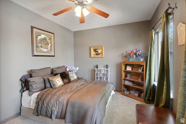 13302 S Corner Wood Dr E, Draper, UT 84020 - carpeted bedroom with a ceiling fan and baseboards