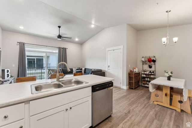 1128 S 820 E Unit 3301, Heber City, UT 84032 - kitchen with stainless steel dishwasher, a sink, vaulted ceiling, light countertops, and white cabinetry