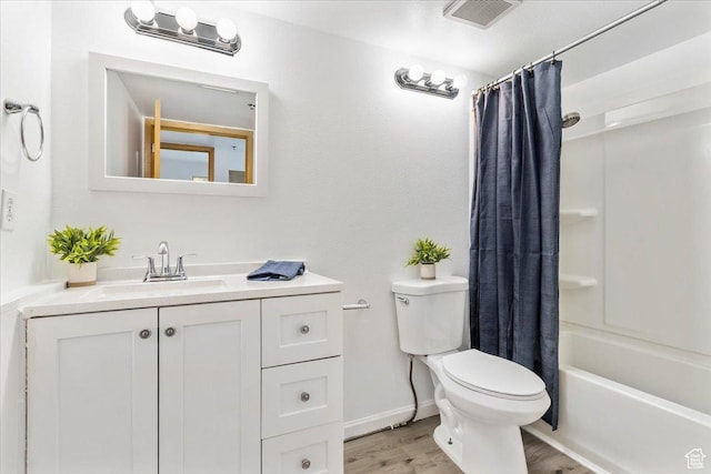 531 S 900 E Unit B2, Salt Lake City, UT 84102 - full bathroom featuring toilet, vanity, wood finished floors, and shower / tub combo with curtain