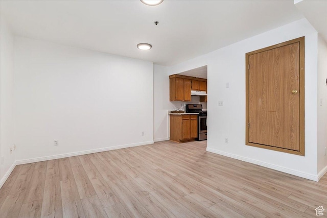 531 S 900 E Unit B2, Salt Lake City, UT 84102 - unfurnished living room featuring light wood-style flooring and baseboards