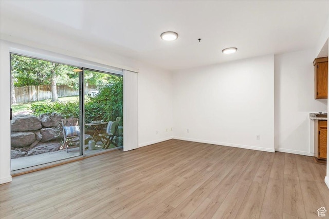 531 S 900 E Unit B2, Salt Lake City, UT 84102 - unfurnished living room with light wood-style flooring and baseboards
