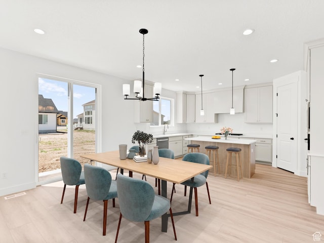 325 N 1040 E Unit 26, Salem, UT 84653 - dining area featuring light wood-style floors, a chandelier, and recessed lighting