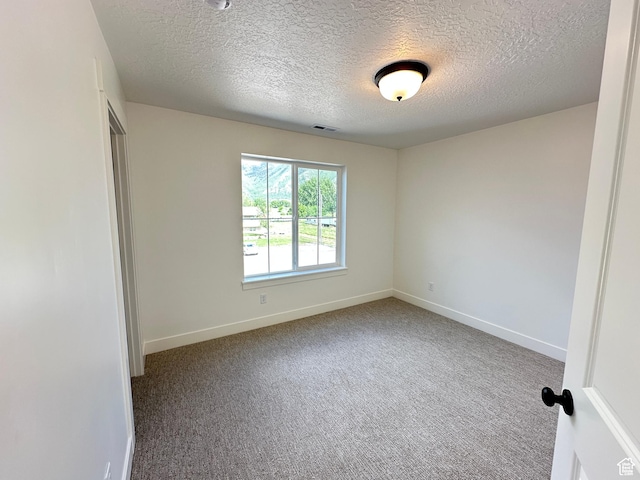 325 N 1040 E Unit 26, Salem, UT 84653 - carpeted empty room with baseboards and a textured ceiling