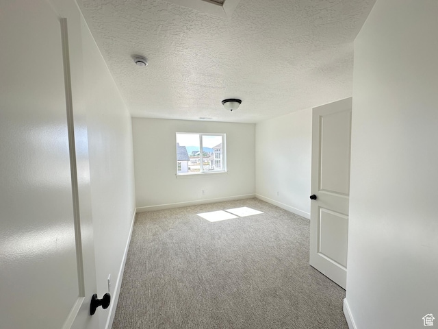 325 N 1040 E Unit 26, Salem, UT 84653 - carpeted spare room featuring baseboards and a textured ceiling