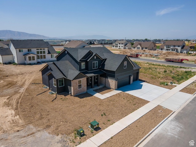 325 N 1040 E Unit 26, Salem, UT 84653 - view of front of house with a residential view, driveway, and board and batten siding