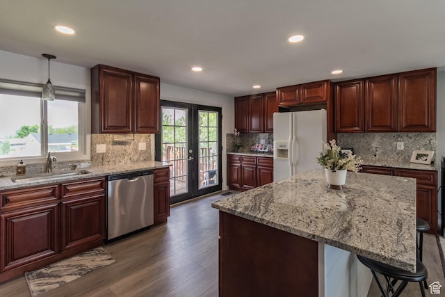366 S 3240 W, Vernal, UT 84078 - kitchen with white refrigerator with ice dispenser, dishwasher, a sink, decorative backsplash, and dark wood-style flooring
