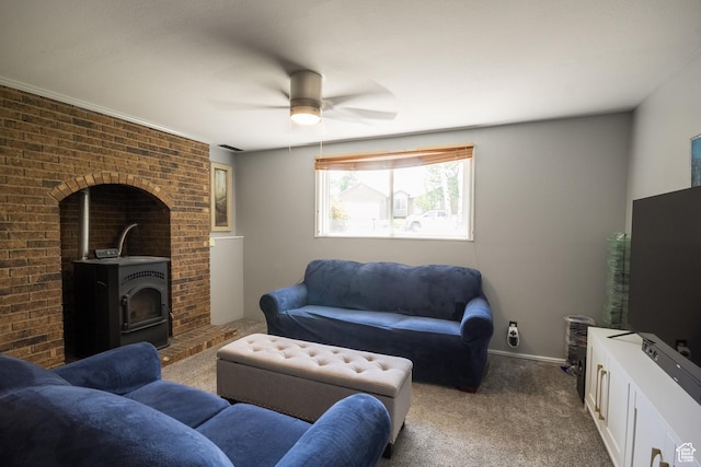 366 S 3240 W, Vernal, UT 84078 - living area featuring dark colored carpet, a ceiling fan, and a wood stove