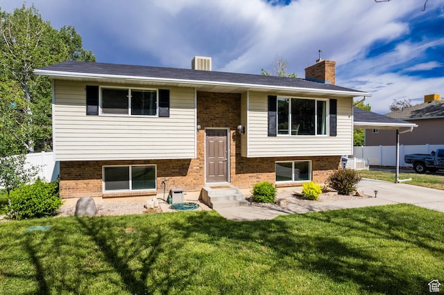 366 S 3240 W, Vernal, UT 84078 - split foyer home featuring brick siding and a chimney