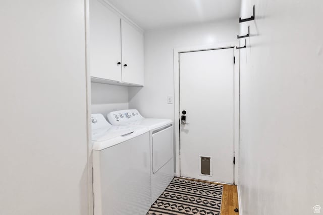 345 W 300 N, Richfield, UT 84701 - washroom with independent washer and dryer, cabinet space, and wood finished floors