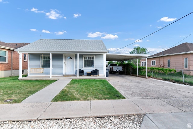 345 W 300 N, Richfield, UT 84701 - bungalow-style home featuring driveway, covered porch, and an attached carport